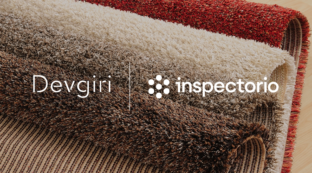 Devgiri and Inspectorio logos over stacked rugs